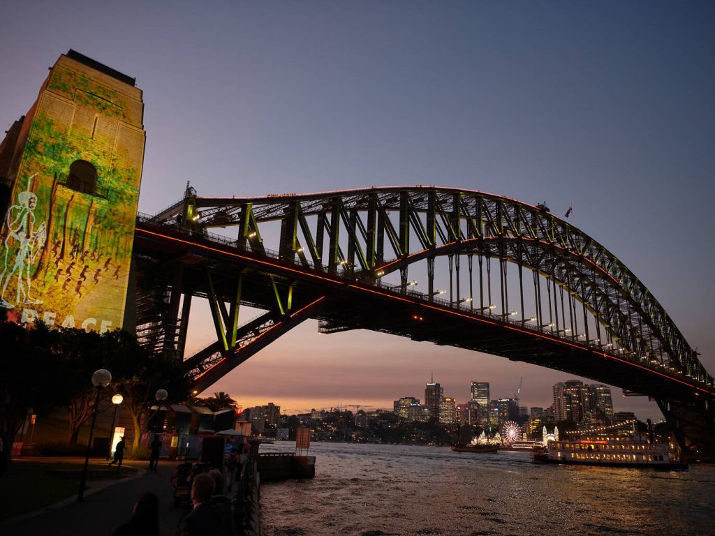 'Eora: Broken Spear' projection on the Sydney Harbour Bridge, by Rhoda Robert OAM and The Electric Canvas - Photo Vivid Sydney