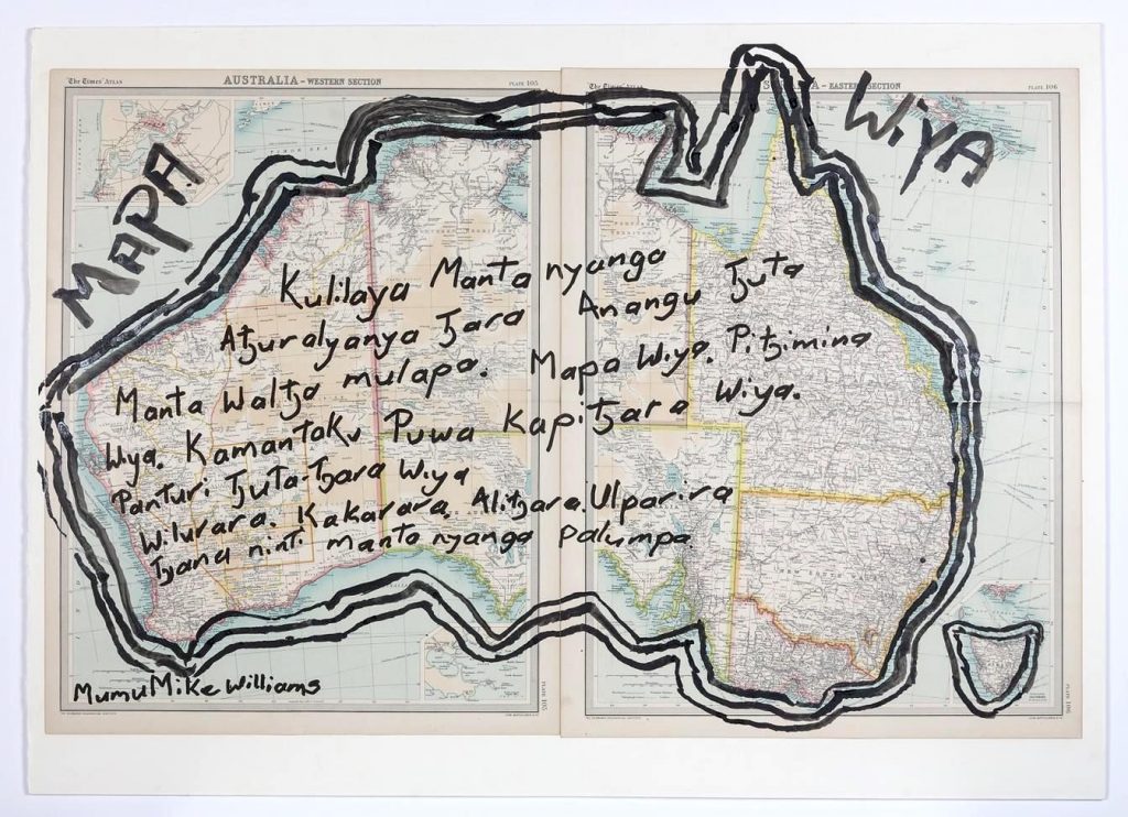 Kunmanara (Mumu Mike) Williams, Pitjantjatjara language group. We don't need a map (Mapa Wiya), 2017. Ink and acrylic on found map, 59 x 90cm. Image courtesy of Fondation Opale, Lens, Switzerland.